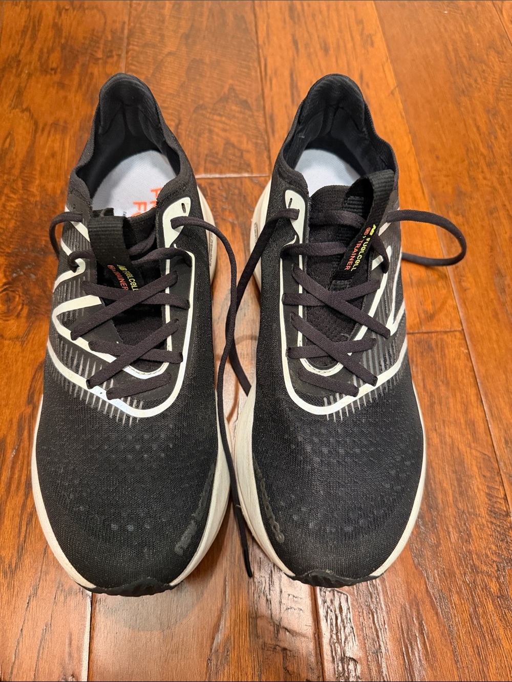New Balance Men's Black and White Running Sneakers size 9